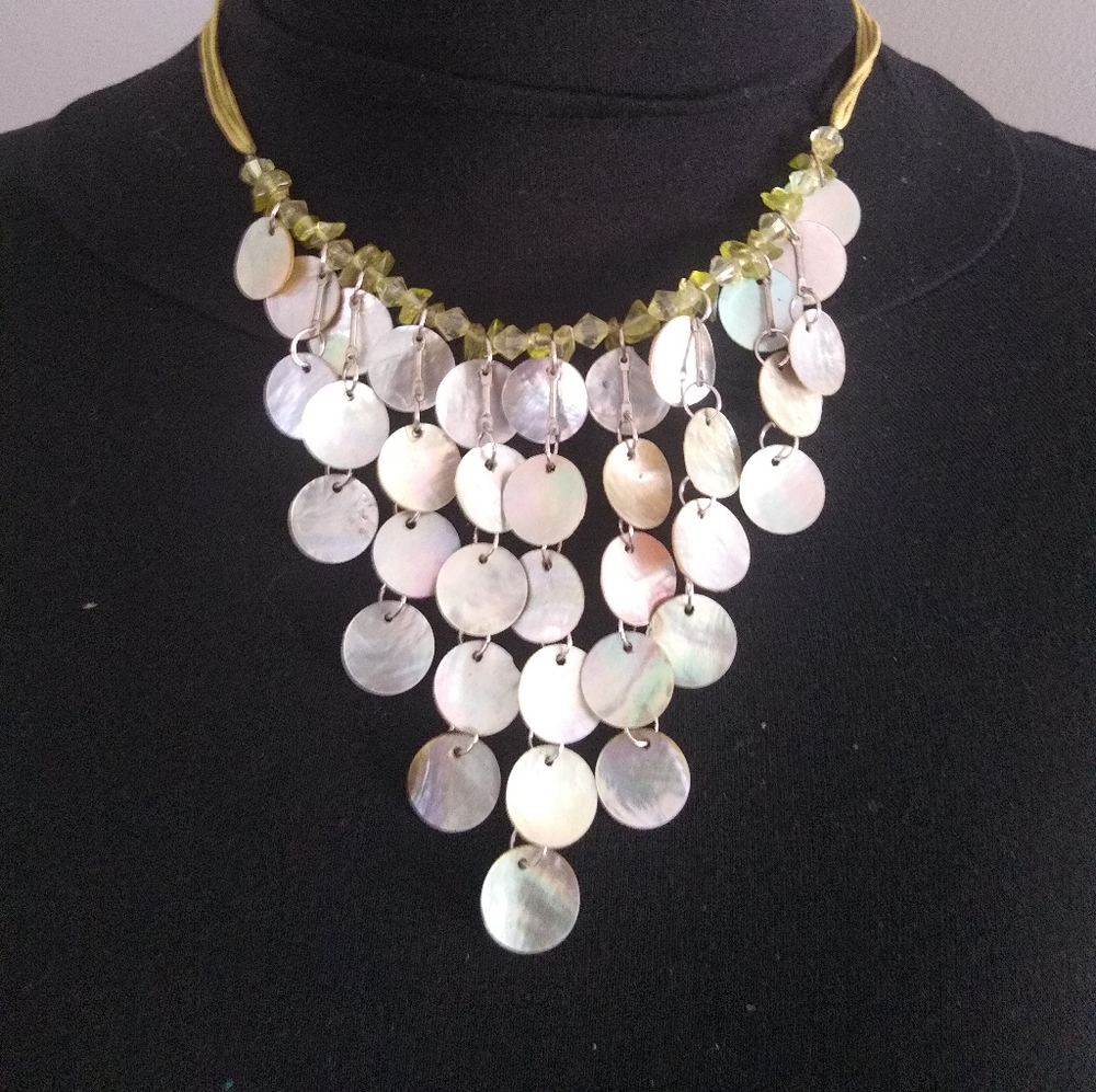 Reversible cascading shell necklace